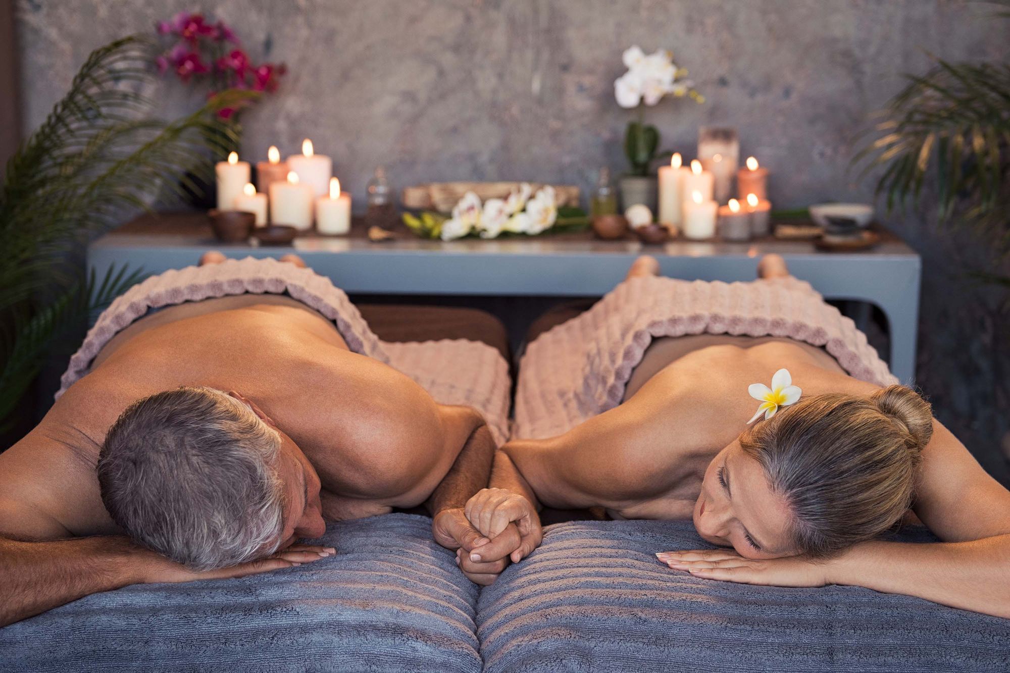 Couple relaxing side by side during a massage