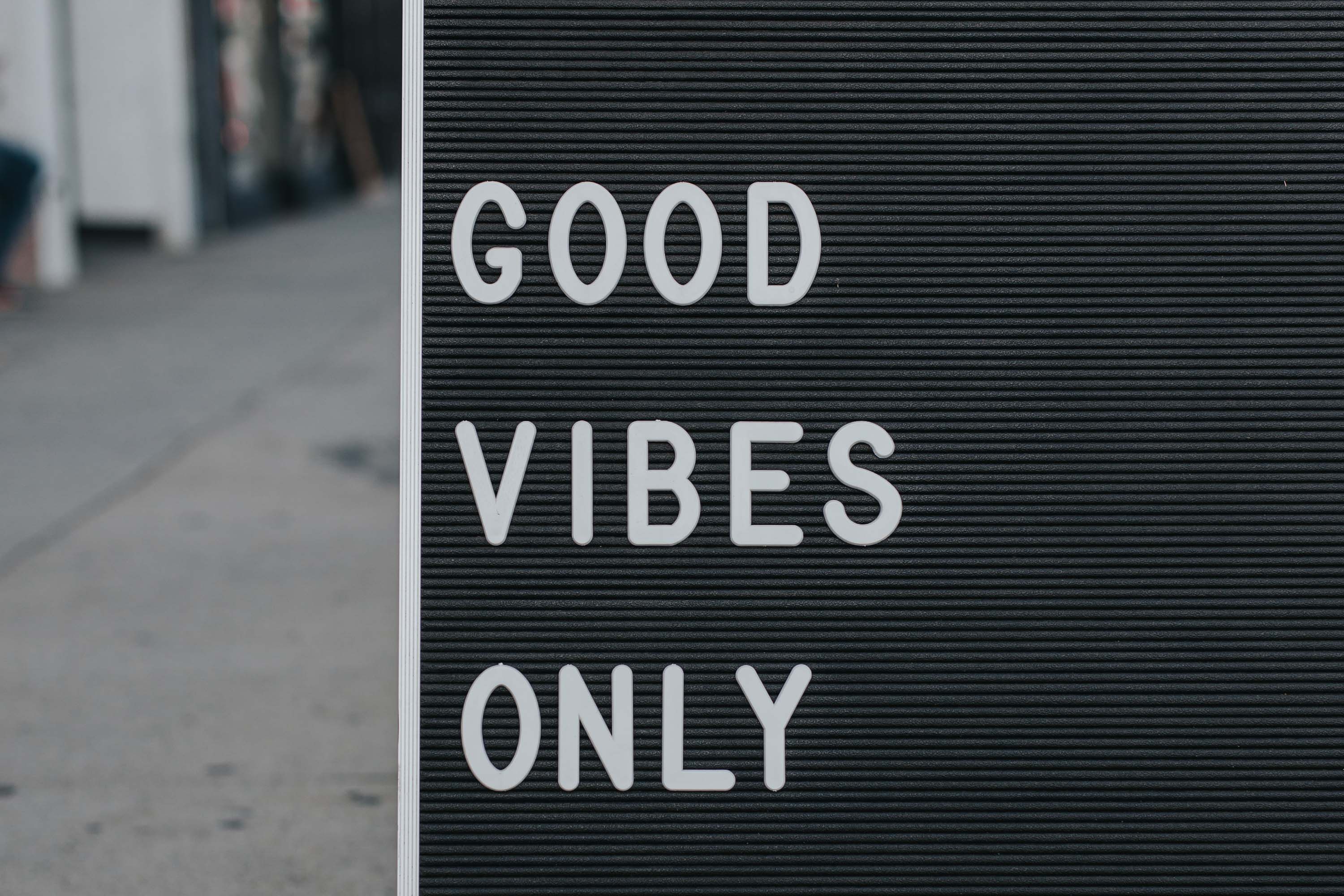 Sign with good vibes only on it