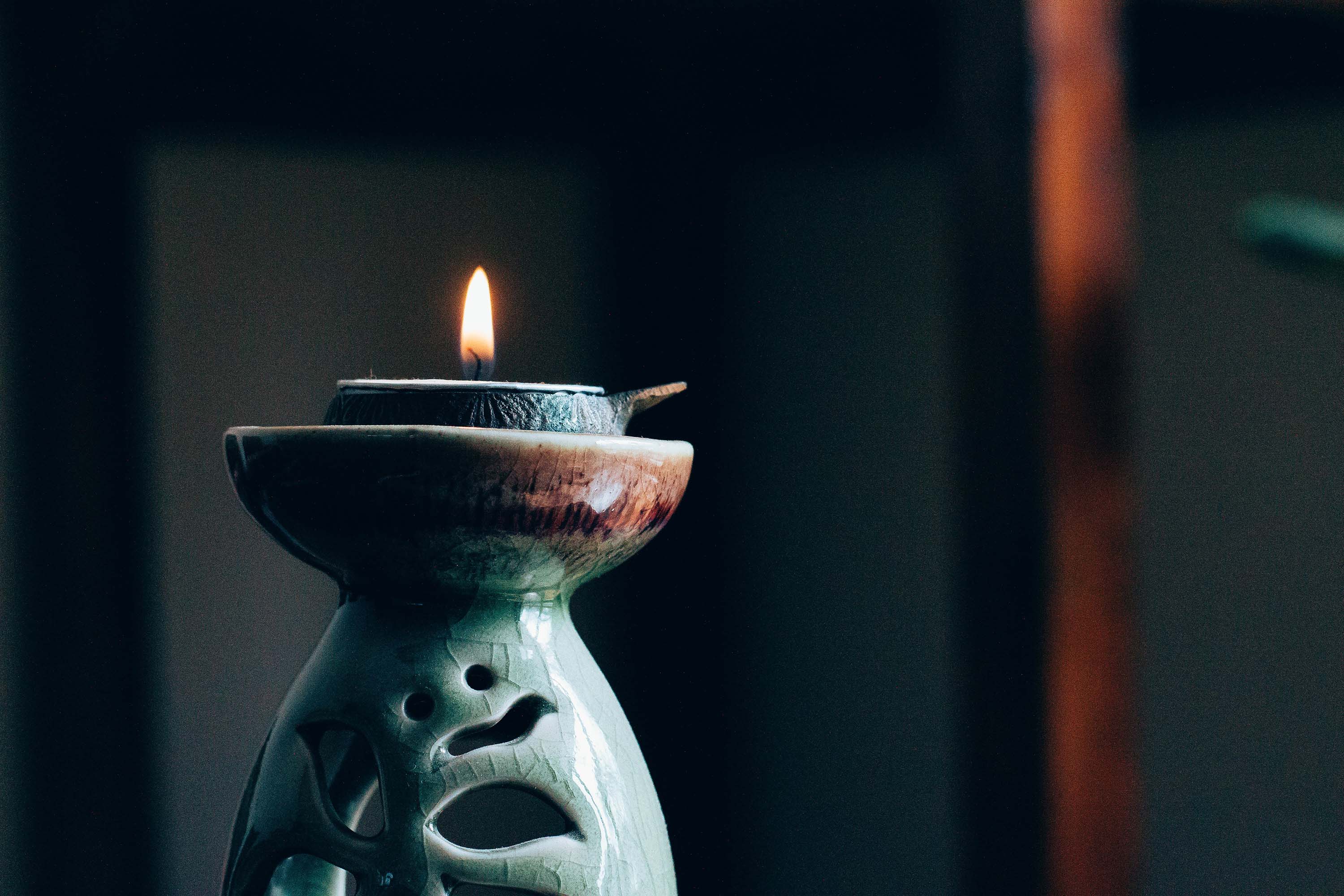 Candle lit in relaxing place